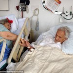 Husband holds hands with his beloved wife of 60 years as they died hours apart